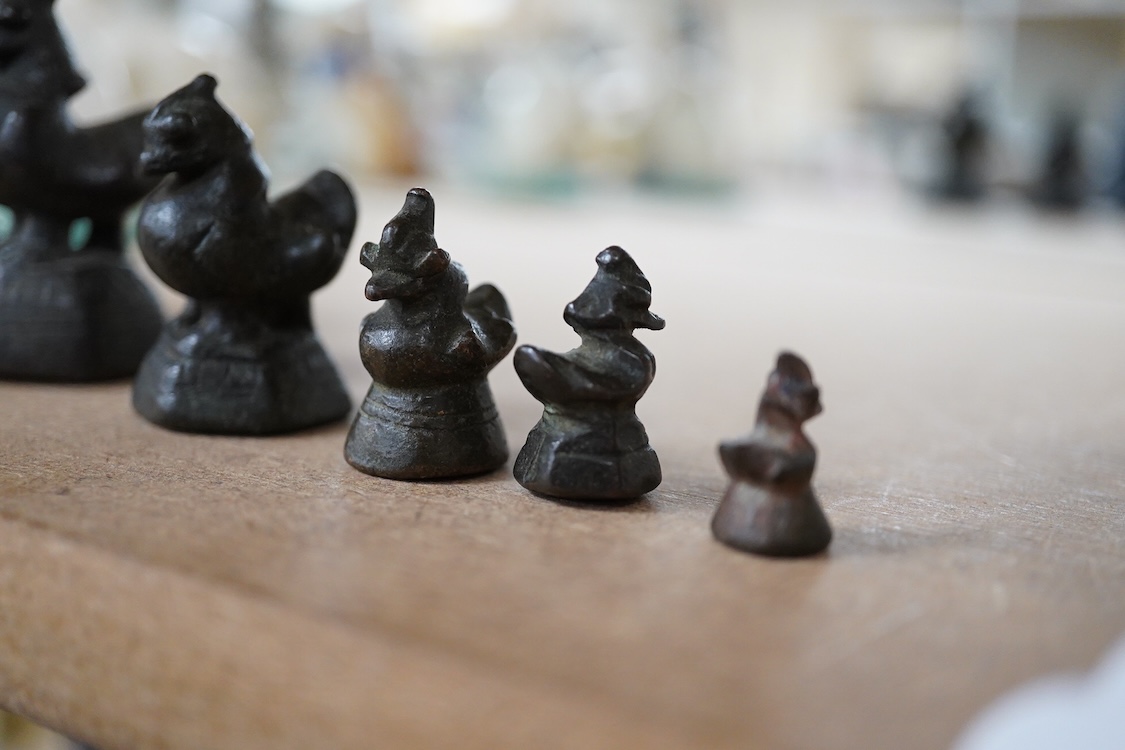 A graduated set of six Burmese bird opium weights, 7cm high